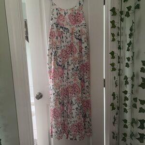Pink and White Floral Romper with Feminine Silhouette